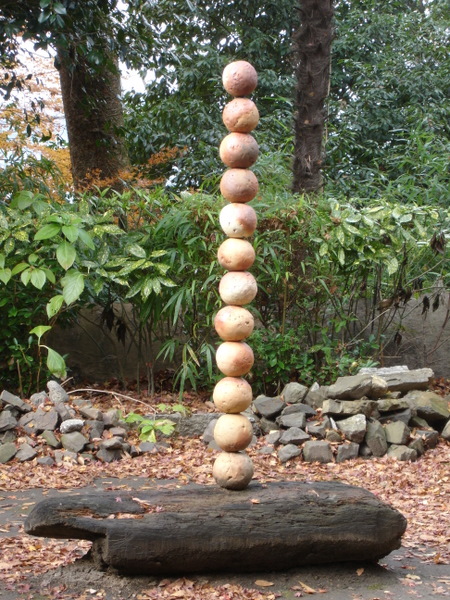 This was behind a pagoda-like sculpture. Any ideas on what it may signify?